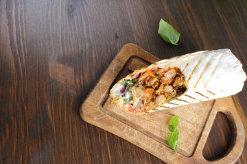 shaurma kebab on a wooden background