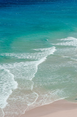 ocean landscape. blue and deep blue water of ocean and beach with surf wave