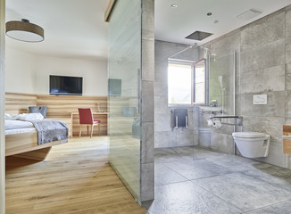 Interior of bedroom and bathroom of a holiday home
