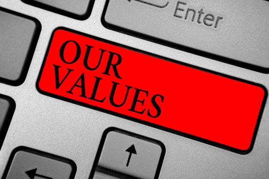 Writing note showing Our Values. Business photo showcasing list of morals companies or individuals commit to do them Keyboard red key Intention computer computing reflection document.