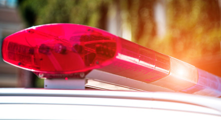Signal lamp on the police car close-up. (Security, help, law - concept)
