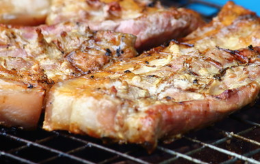 delicious food pork grilling on hot charcoal