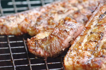 delicious food pork grilling on hot charcoal