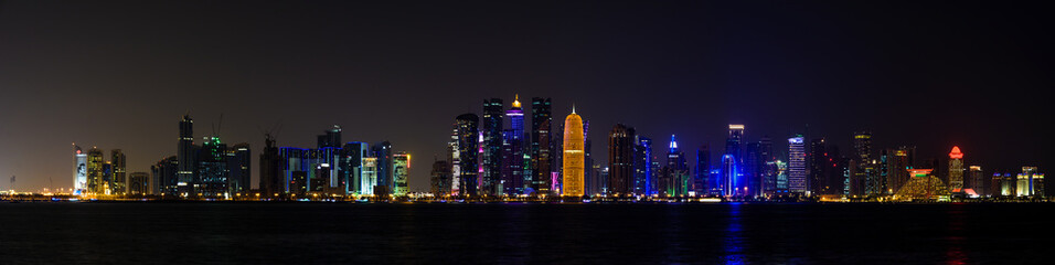 Fototapeta na wymiar Ultrawide panorama of Doha skyline at night