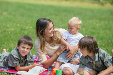 Happy family, having picnic in the rural, aerial view of Devonshire