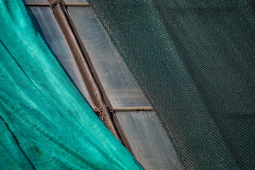 Two types of protective mesh on the roof of the greenhouse close
