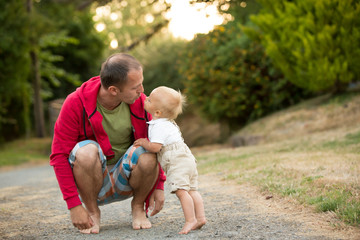 Portrait of happy father and his little son, son hugging his father, father's day concept