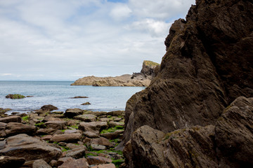 Rocky beach in England, ocean and cliffs