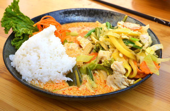 Asian Street Food chicken with rice and vegetables