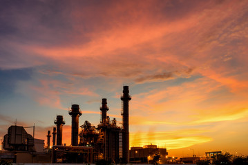 Fototapeta na wymiar Power plant in the industrial estate with twilight sunset