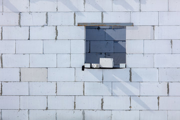 Window in the wall made of bricks