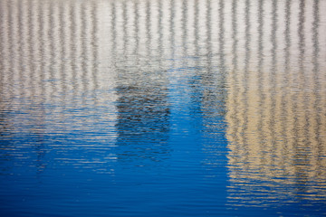 Reflection of a building on the surface of water