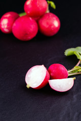 Red fresh radish on wooden