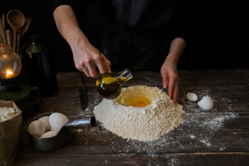 Steps of making cooking pie with ingridients. Mixing ingredients: flour, eggs, oil. See series....