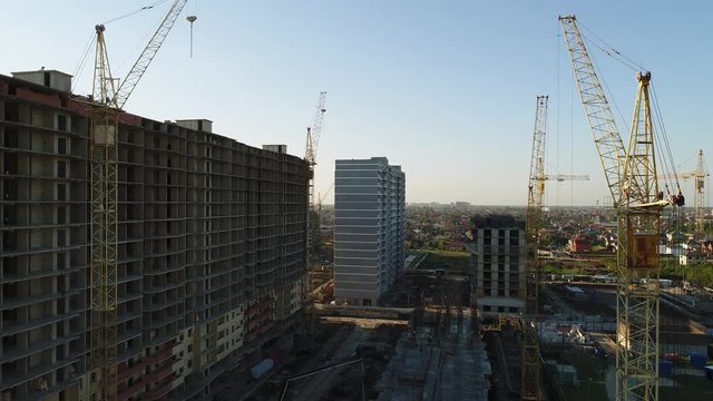 Aerial view - building cranes and buildings.