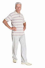 Fototapeta premium Portrait of a senior man posing isolated