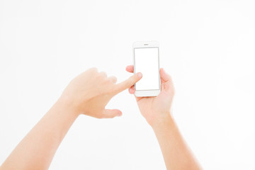 Hand holding white phone isolated on white clipping path inside. Top view.Mock up.Copy...