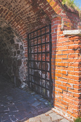 old gates, ironwork, stone brick wall