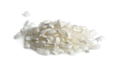 Uncooked Japanese milled rice isolated on white background.