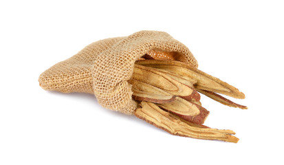 dried Liquorice roots on a white background.