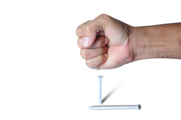 a punch of adult in action of hitting on nail on white background isolated