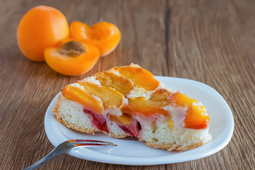Apricot pie on a white plate.