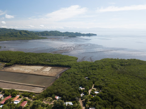Aerial drone image of a local shrimp farm in Paquera Costa Rica on the Gulf of Nicoya