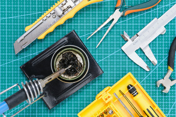 Still life with tools for handmade on the work pad.