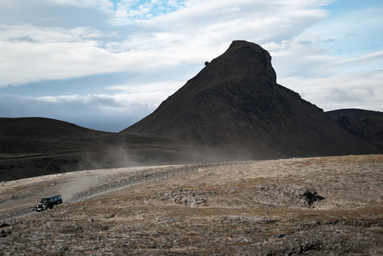 Jeep with mountain behind in iceland