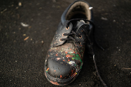 Painters shoe on beach