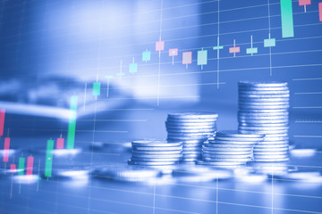 Stack of money coin with trading graph, financial investment concept use for background