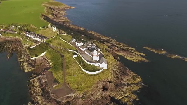 Roche's Point Lighthouse is situated at the entrance to Cork Harbour, Ireland. A lighthouse was first established on 4 June 1817 to guide ships into Cork Harbour