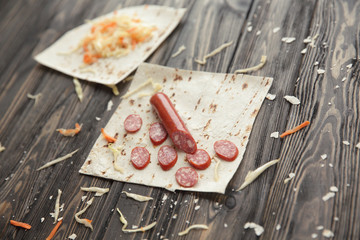 preparation of Shawarma. ingredients on wooden table.photo with 