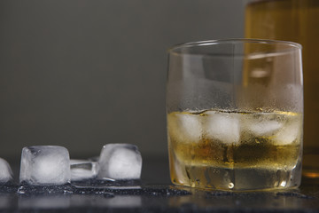 Whisky and glass drop ice cubes, alcohol wallpaper.