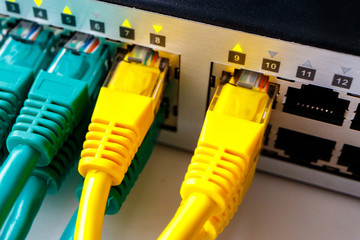 the shiny front part of the switch into which patch cords are inserted
