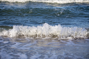 Wave on Clear Sand Beach