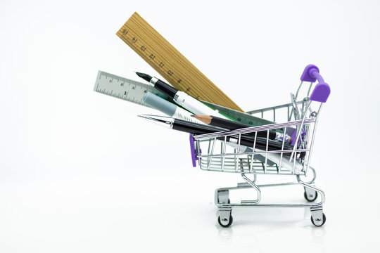 Shopping cart with tools for education. Image use for online and offline shopping, marketing place world wide, business concept.