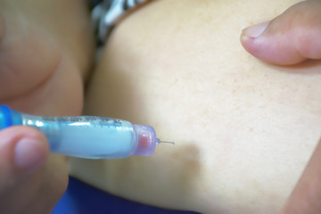 Everyday insulin injection the stomach area.