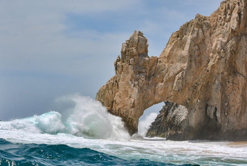 Waves hitting famous cabo landmark in Mexico