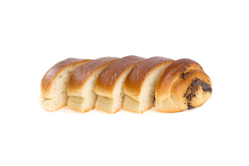 Homemade dough, roll with poppy filling isolated on white background