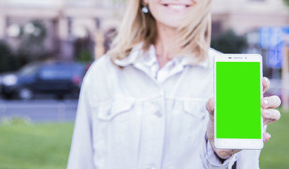 The smartphone in the hands of women