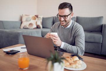 Businessman working from home on laptop