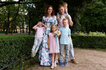 happy caucasian family in park