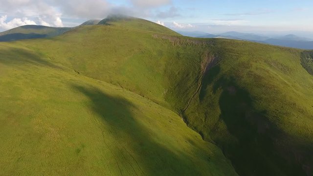 Aerial of a mountain range looking like female orge legs in the Carpathians