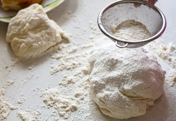 Wheat flour sprinkled on the dough homemade