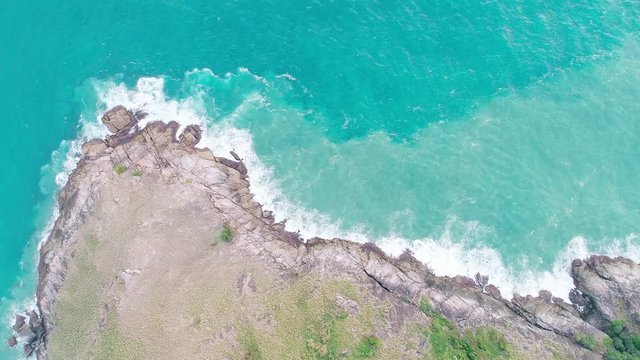 Aerial View of the tropical sea foam and splashes in the ocean Turquoise water at thailand