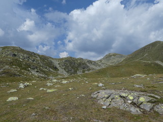 summit rock panorama landscape of the high mountains in south tyrol italy europe with clouds