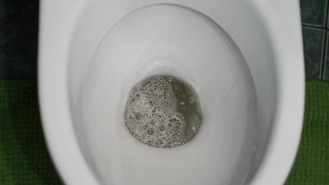 Washout of water in a toilet tank.