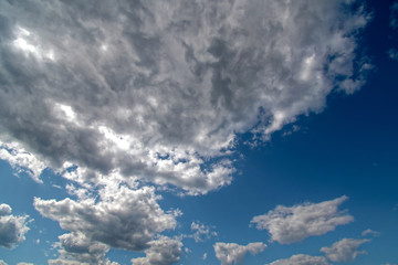 White and gray clouds on a blue sky 