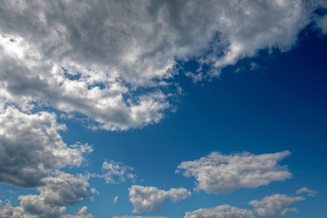 White and gray clouds on a blue sky 